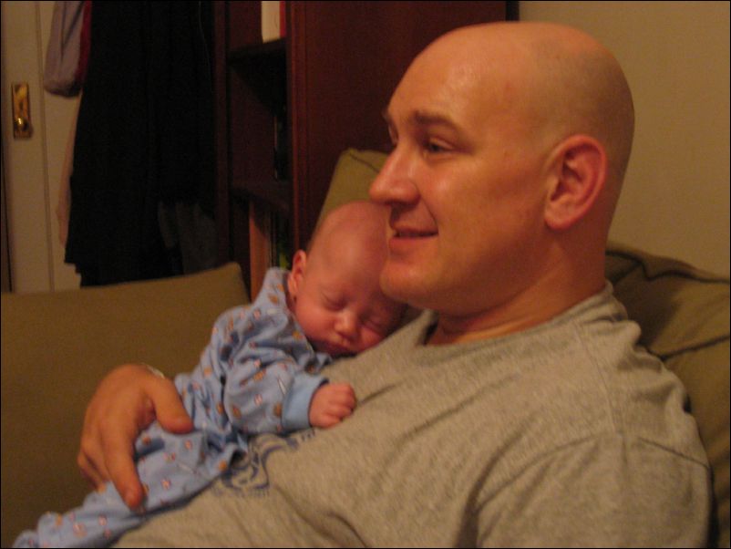 Owen sleeping on Daddy